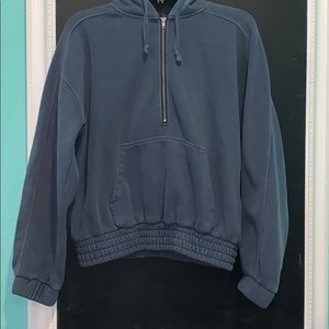 Blue cropped hoodie.